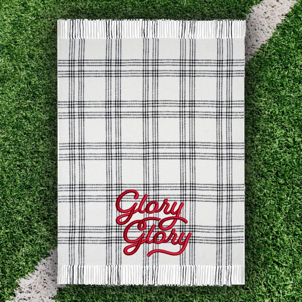 Glory Glory black and white plaid throw with football field background